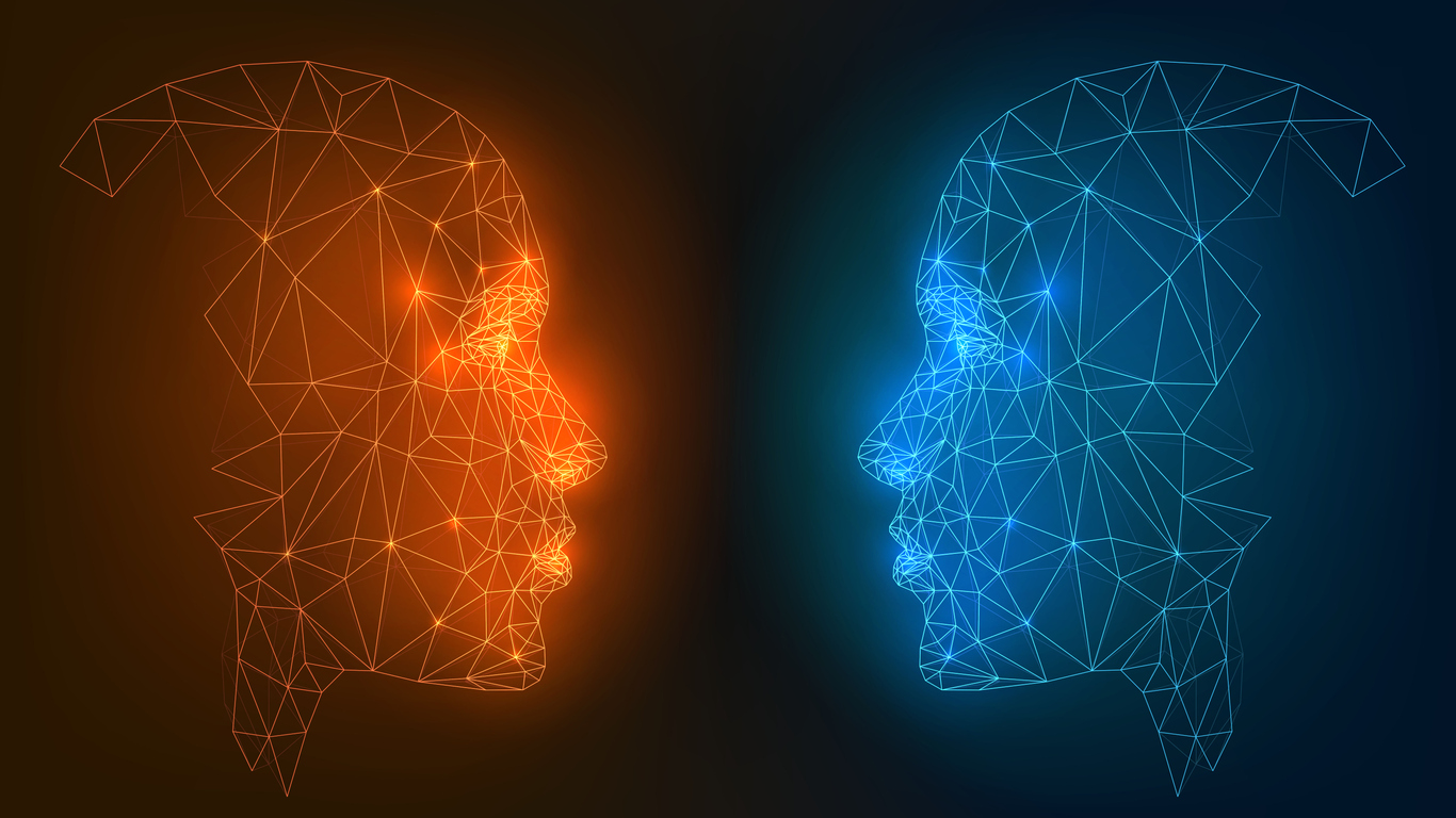 Two wireframe heads, facing each other, one red and one blue.
